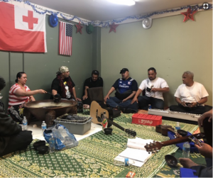 Group of Tongan men enjoying kava.