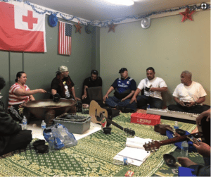 Group of Tongan men enjoying kava.